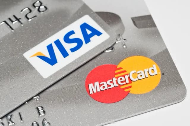 Visa, Mastercard jockey to set agentic standards | Payments Dive